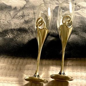 Beautiful Champagne Flutes. Interlocked gleaming Silver with Crystal Accents.